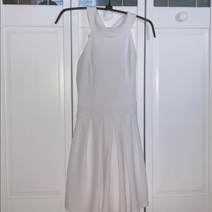 White high neck dress with bow on back